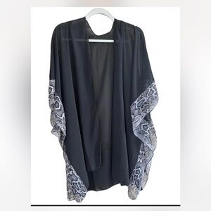 black chiffon kimono cardigan with a snakeskin or animal print trim